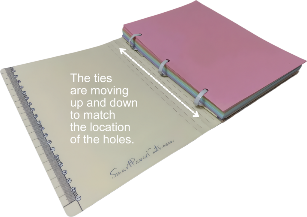 A5 size Ringless binder using ties instead of rings. The arrow shows the movement direction of ties to match positions of the punched in the paper holes.