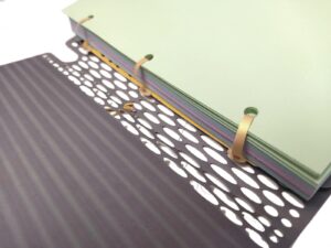 Ring-less binder A5 size with leaflets bound with ties Ring-less binder A5 size with leaflets bound with ties